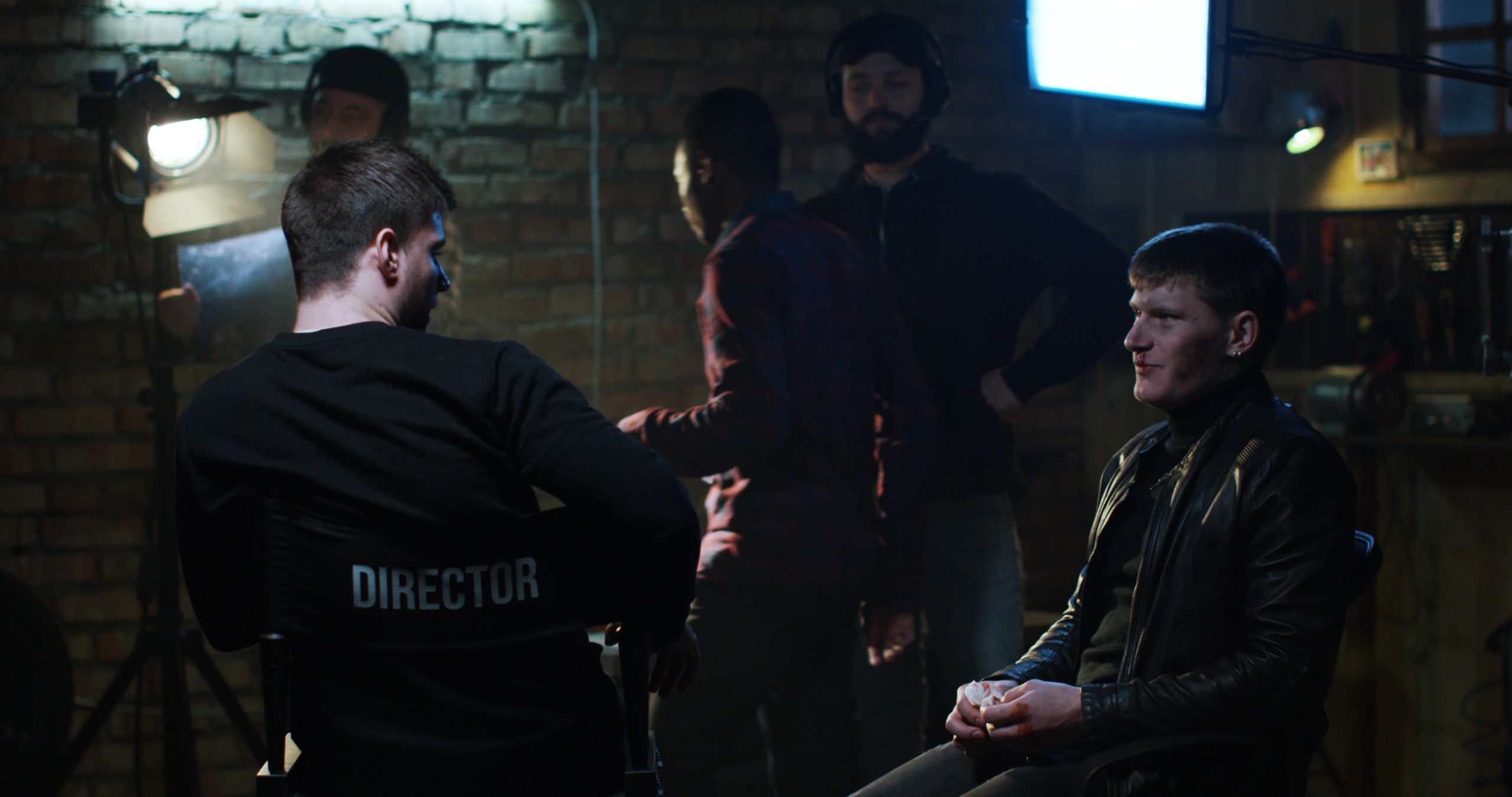 Actor and director discussing a scene on set