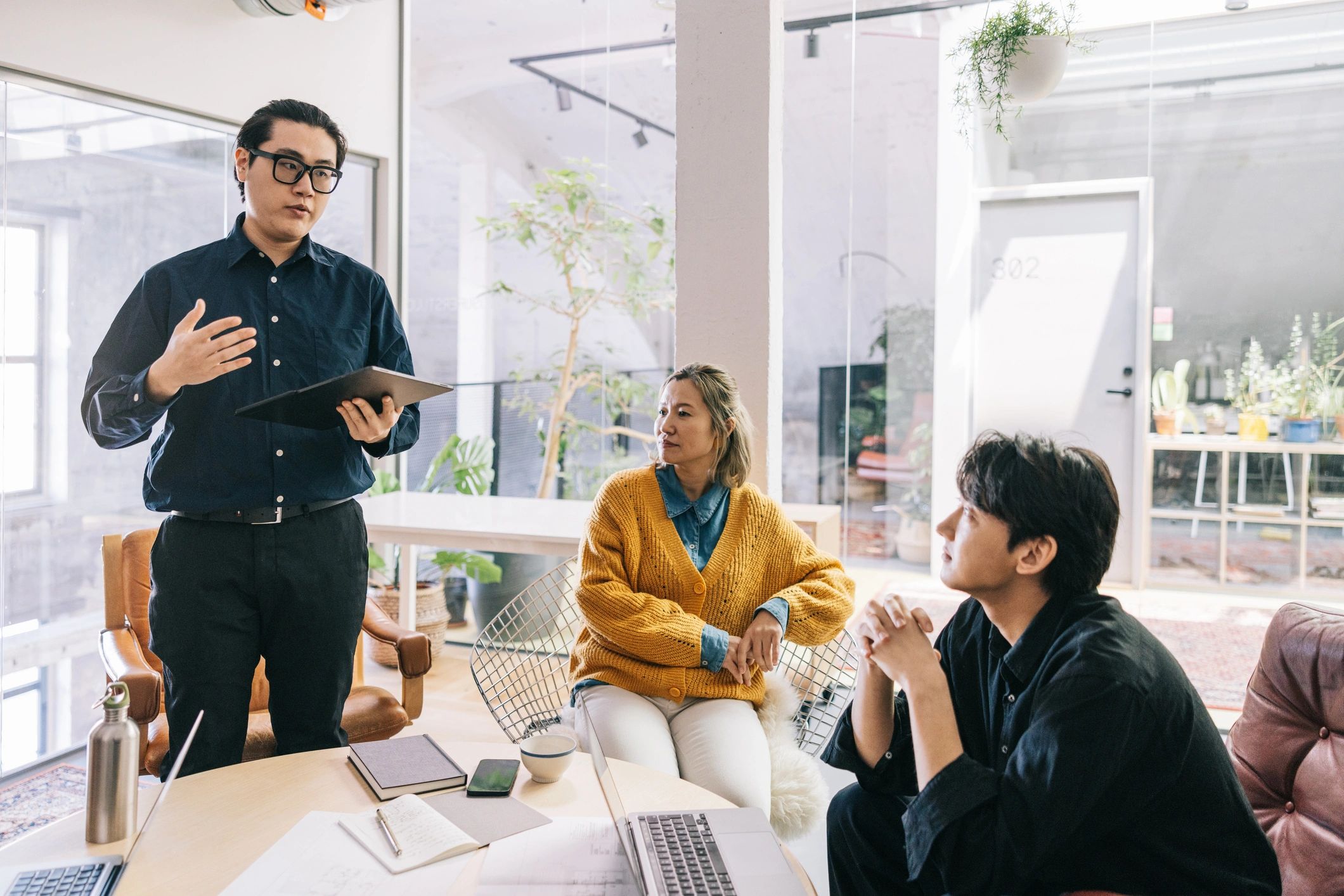 Diverse team meeting in stylish startup office