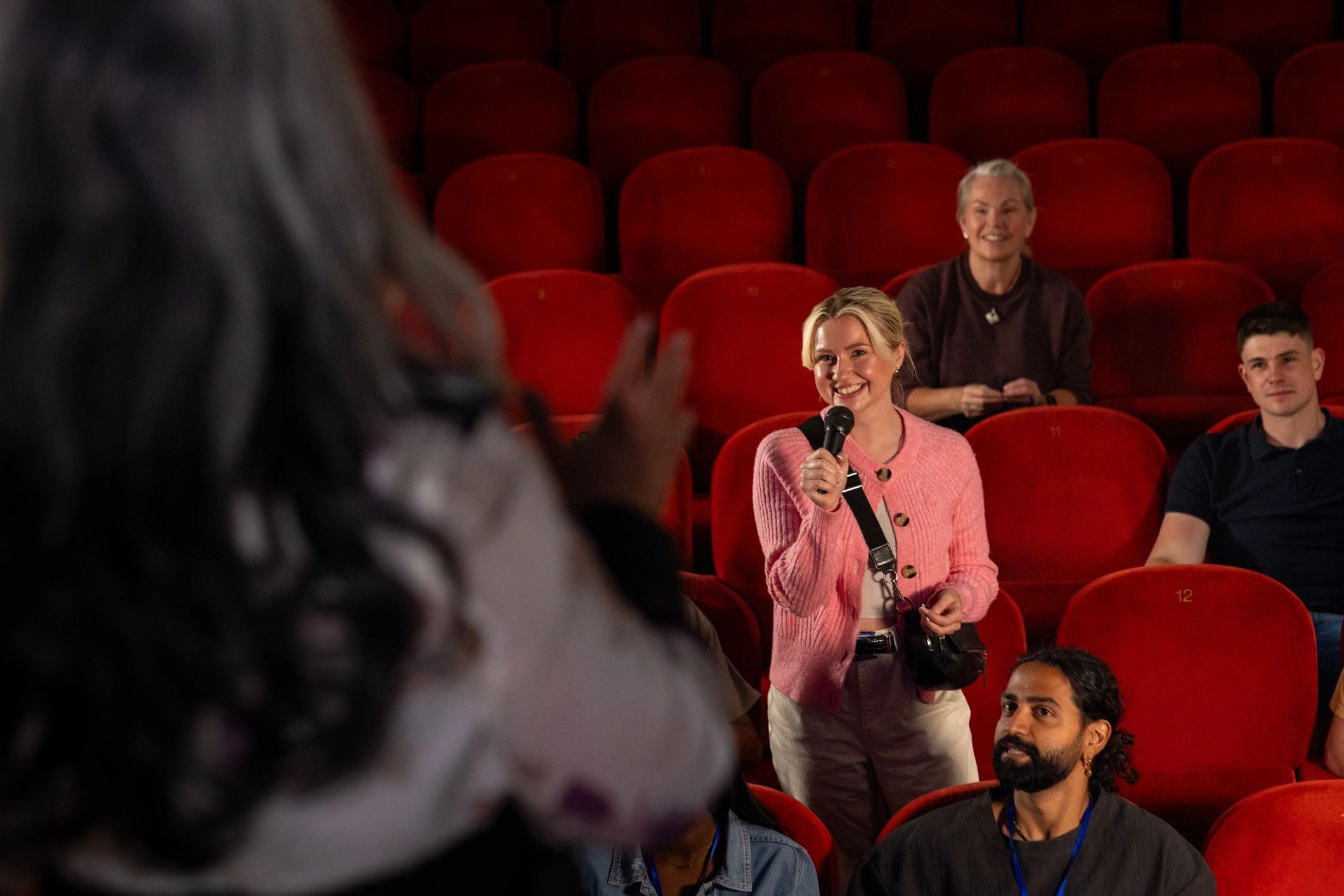 Business audience engaging during a professional event presentation