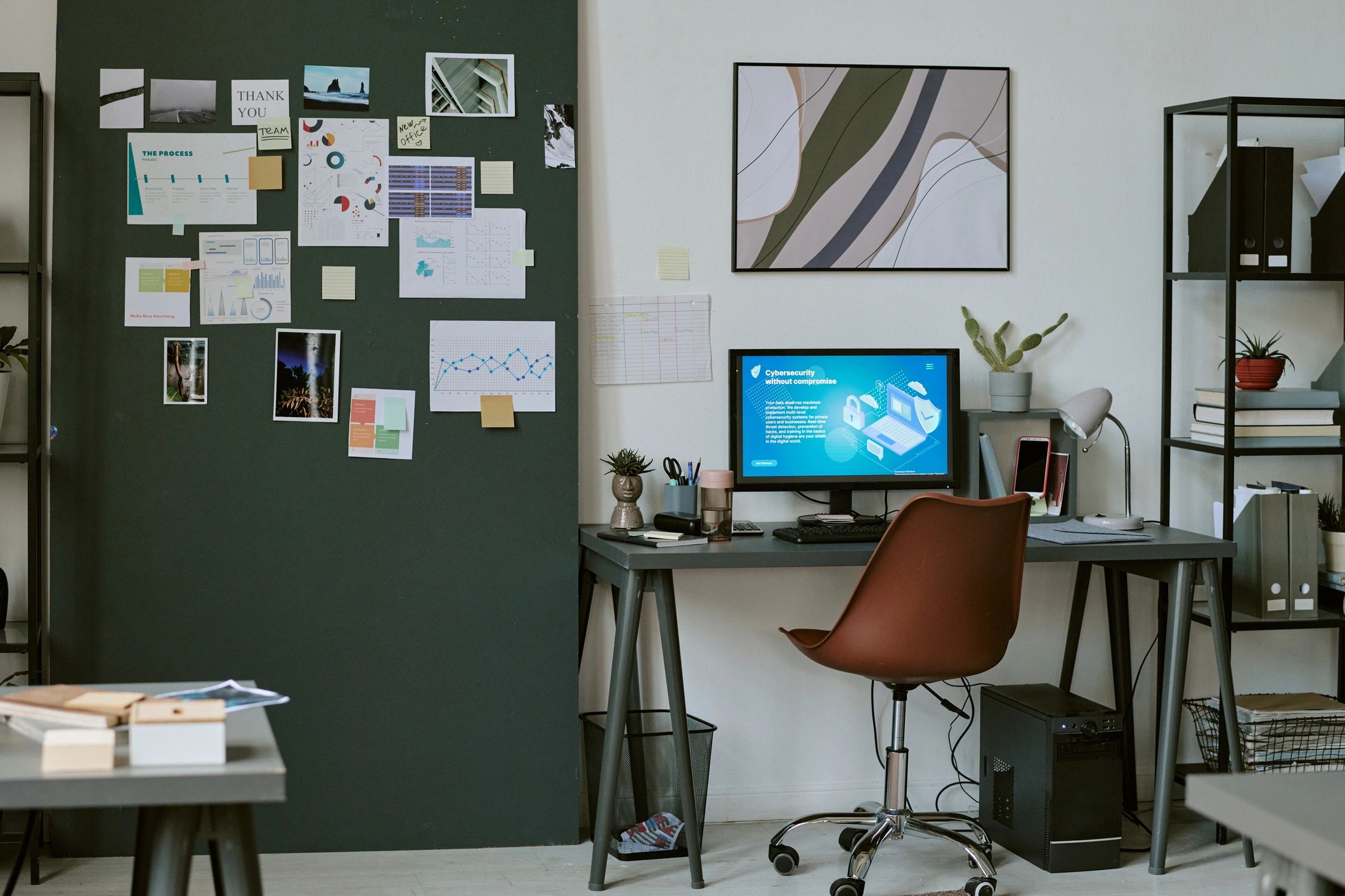 Digital analytics workspace with charts and planning boards
